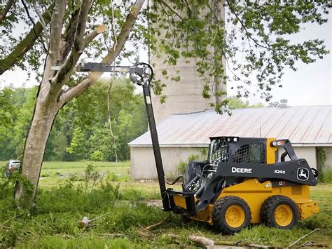 hydraulic tree saw for skid steer or tractor bucket|skid steer limb buster.